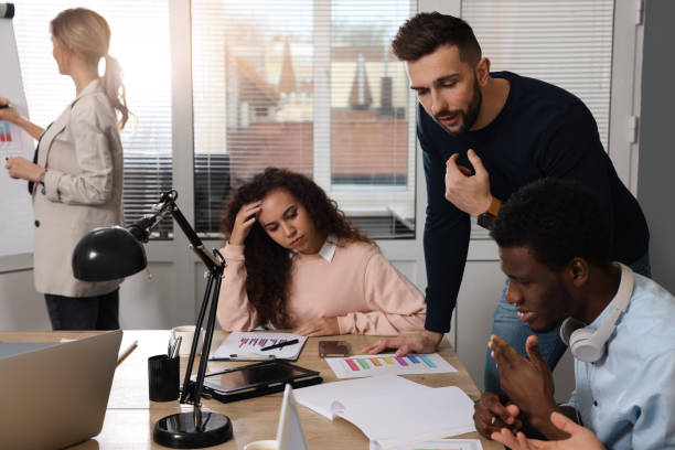 istock Team of employees working together in office. Startup project 1452470698