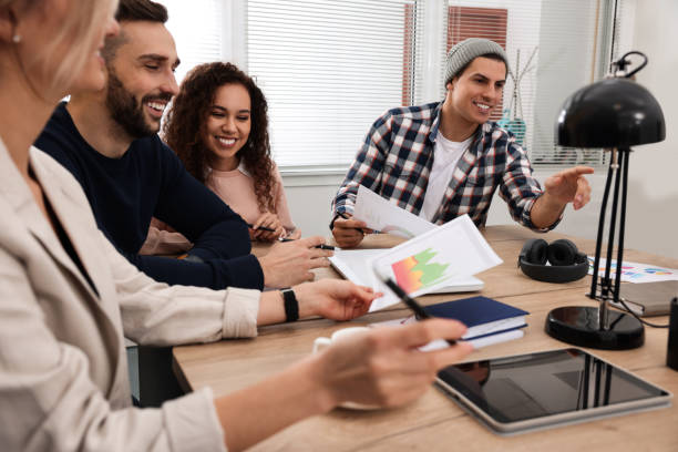 istock Team of employees working together in office. Startup project 1452471505