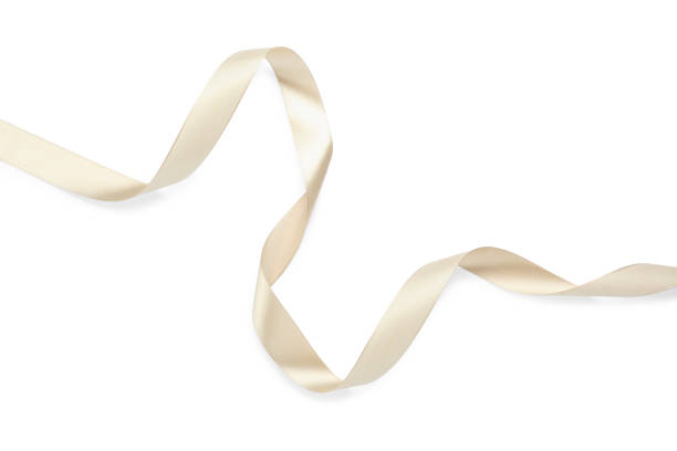 istock Beautiful beige ribbon isolated on white, top view 1452471935