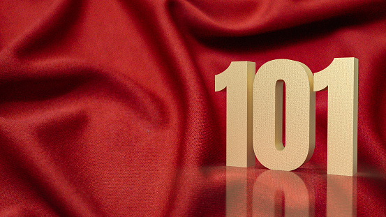 The gold number 101 on red silk for business concept