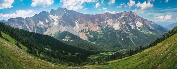 istock Aerial view of mountain landscape surrounded by dense trees 1452476310