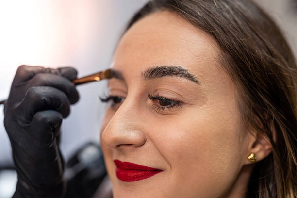 istock eyebrow correction and modeling in a beauty salon close-up. perfect eyebrows eyebrow coloring. 1452480594