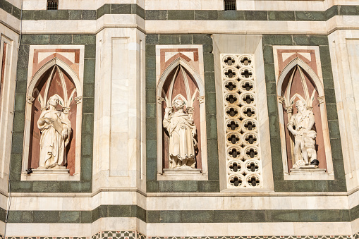 Sculptures on Duomo Santa Maria del Fiore at Florence in Tuscany, Italy