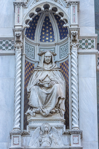 Religious Sculpture on Duomo Santa Maria del Fiore at Florence in Tuscany, Italy