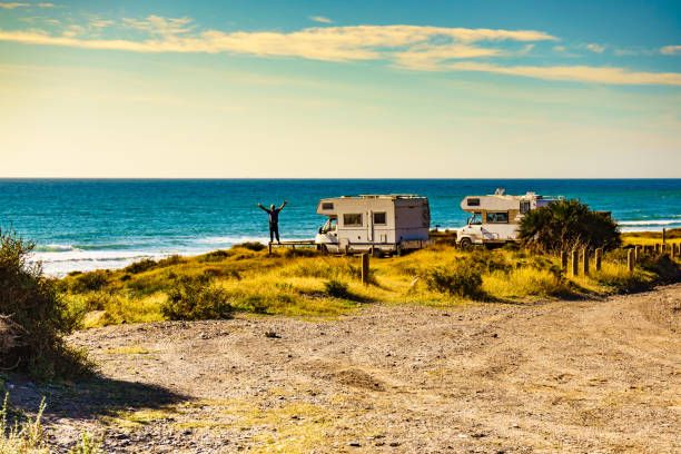 istock Tourist traveling by camper, camp on seashore, Spain 1452482816