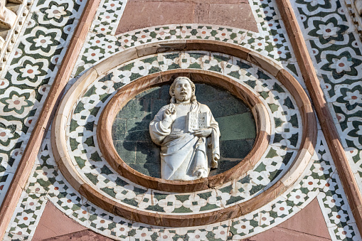 Sculpture on Duomo Santa Maria del Fiore at Piazza del Duomo at Florence in Tuscany, Italy