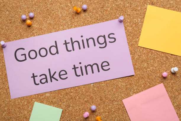 istock Cork board with motivational quote Good Things Take Time 1452485590