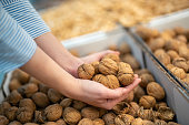 Handful of walnuts in shell