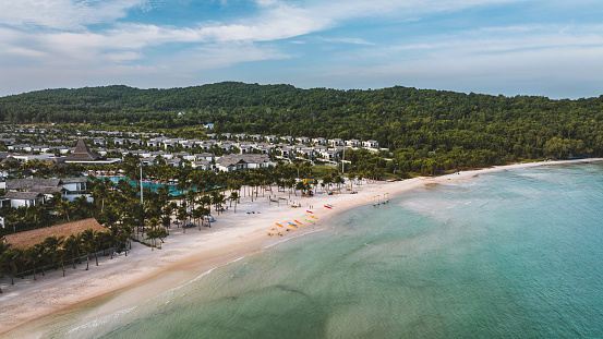 Khem Beach - Bãi tắm Khem - in the south of the vietnamese island Phú Quốc. Aerial Drone Point of view over the famous public white sandy Khem Beach Lagoon, Beach and Bay. Khem Beach - Bãi tắm Khem - Phu Quoc, Vietnam, Southeast Asia.