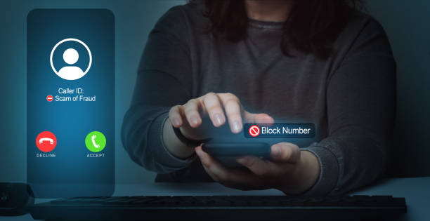 istock Woman blocking scam call on smartphone. 1452491406