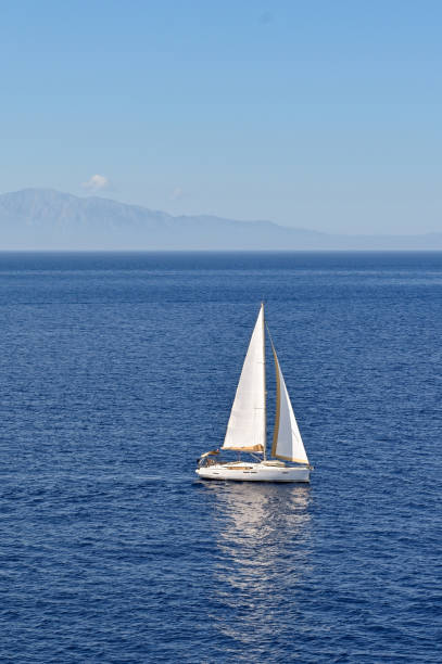 istock Sailing boat on blue sea 1452491499