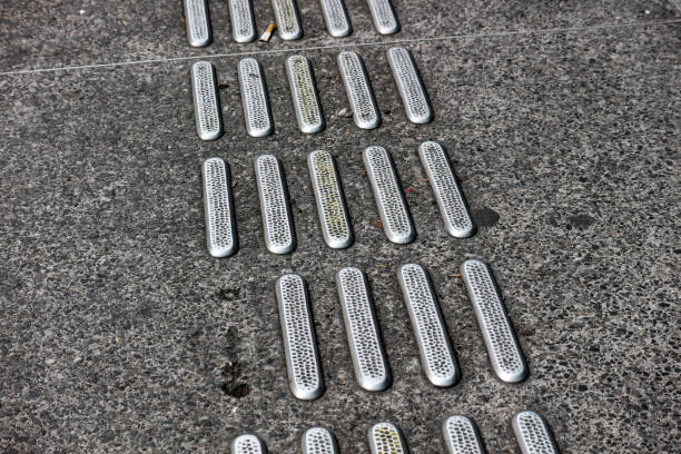 istock Guiding Block or guide way, which is a sign specifically for persons with disabilities, especially for those with visual impairments. 1452497609