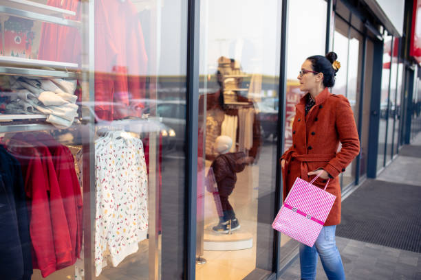 istock Woman Window Shopping 1452498225