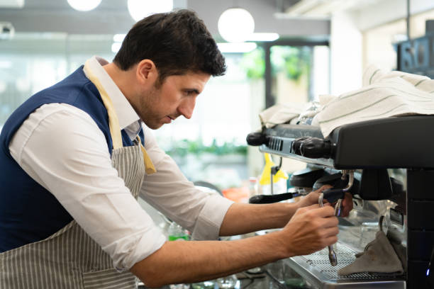 istock Coffee expert barista Making hot Americano for customers 1452501330