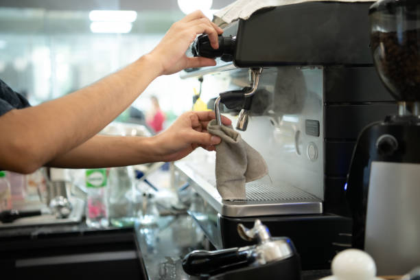 istock Coffee expert barista Making hot Americano for customers 1452501409