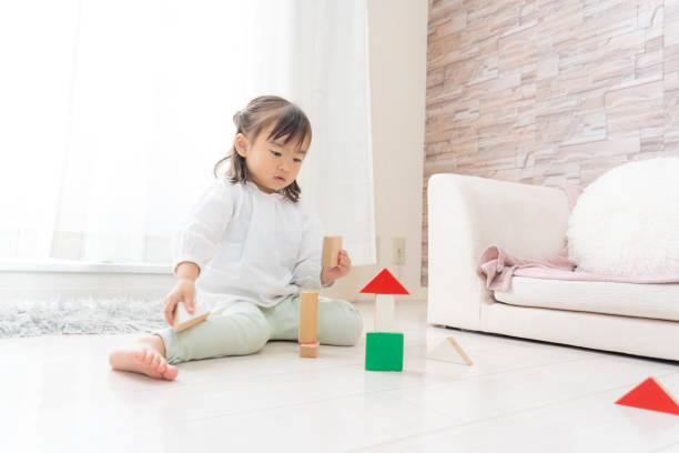 istock Girl playing with toys 1452502476