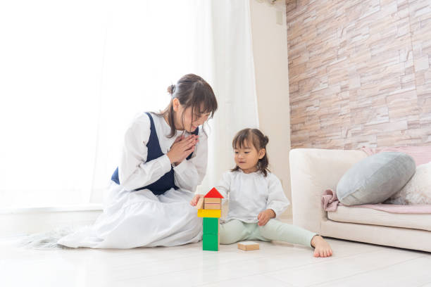 istock Girl playing with toys 1452502530