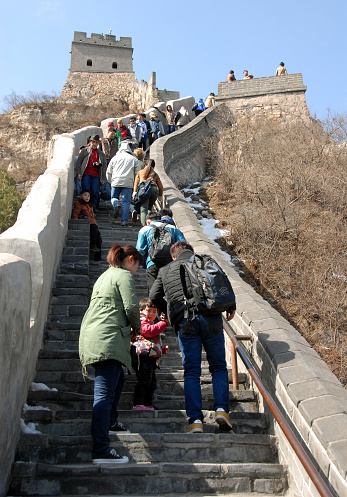 The Great Wall of China. People walking on the section of the Great Wall at Juyongguan near Beijing. The Great Wall of China is a UNESCO World Heritage Site.