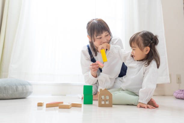 istock Girl playing with toys 1452504077