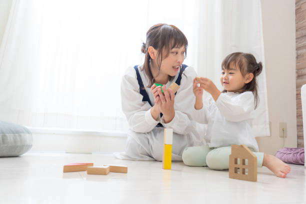 istock Girl playing with toys 1452504084