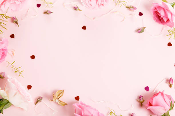 istock Festive flower composition on pink background. Overhead view 1452506750