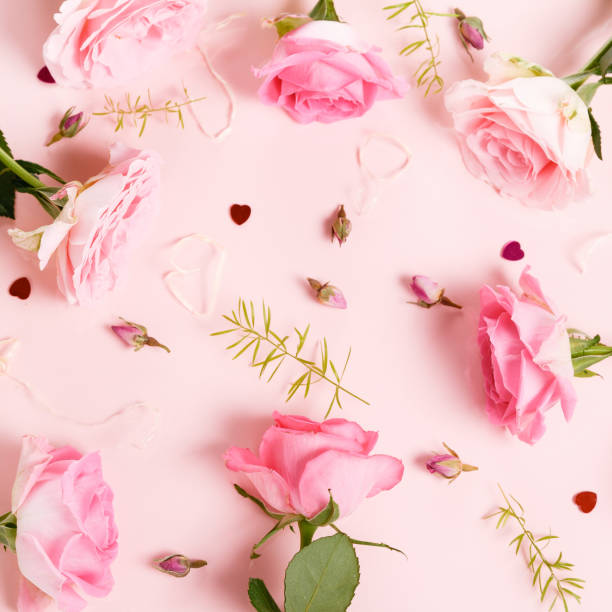 istock Festive flower composition on pink background. Overhead view 1452506762
