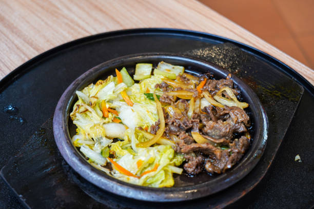 istock beef teriyaki yakiniku served with vegetables on a hot plate 1452506880