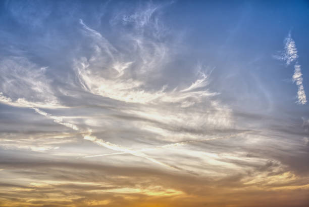 istock Yellow sky clouds from the sun's rays are about to set. 1452507370