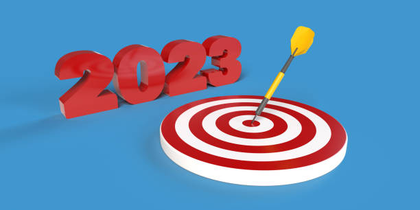 istock 2023 Text with dart hitting red bullseye target 1452507377