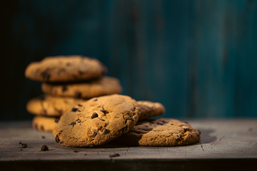 Close up on cookies in the shadow, dark food photography.