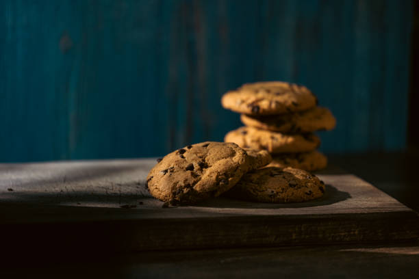 Close up on cookies in the shadow, dark food photography.