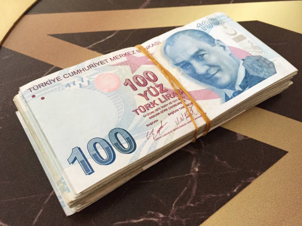 istock Turkish banknotes, Bundle of Turkish money on the table 1452511372