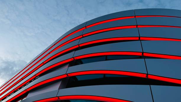 Abstract building facade with red illuminated stripes stock photo