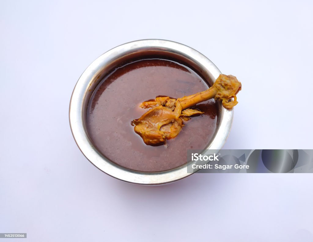 Indian chicken curry in a bowl with an isolated white background Bowl Stock Photo
