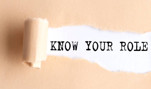istock The text KNOW THE ROLE appears on torn paper on white background. 1452513110