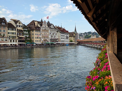 A beautiful shot of traditional buildings by a water canal in Lucerne, Switzerland