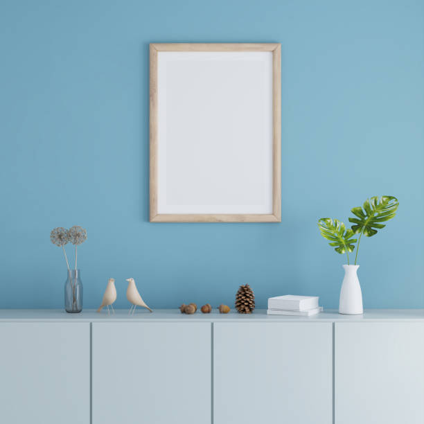 istock Sideboard in blue living room with picture frame mock up, 3D rendering 1452515202