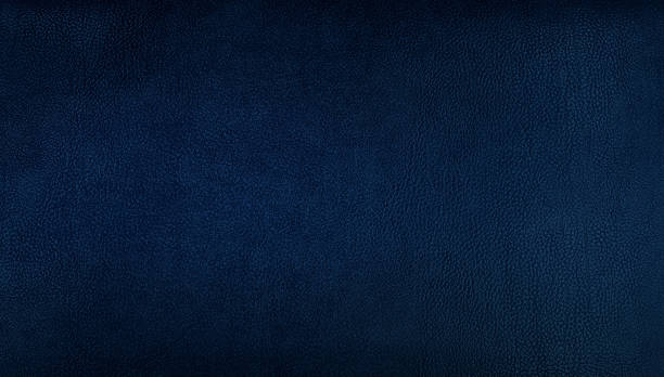 istock dark blue genuine leather texture background for vintage, classic concept. blue background for decorations and textures. dark blue, navy color leather skin natural with design lines pattern. 1452518719