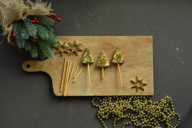 istock Sliced ​​cheese with oregano in a festive meal. 1452523274