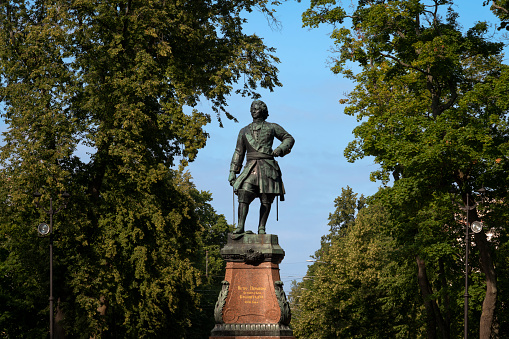 Monument to Peter the Great in Kronstadt on a sunny summer day, St. Petersburg, Russia. The inscription on the monument To Peter the Great, the founder of Kronstadt, 1841.