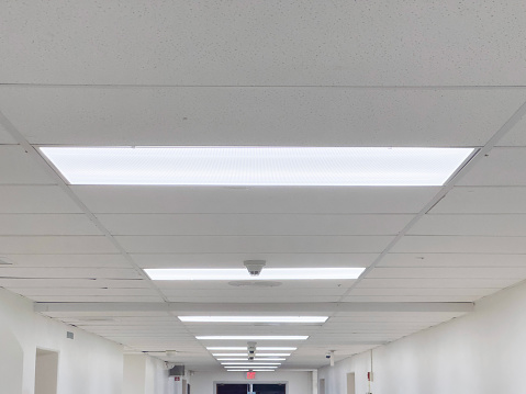 Ceiling lamps in a corridor of a public school