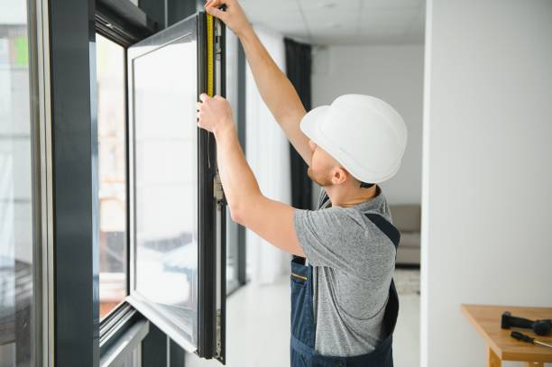 handsome young man installing bay window in new house construction site handsome young man installing bay window in new house construction site replacement stock pictures, royalty-free photos & images