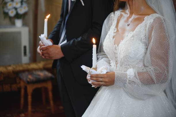 istock Priest during a wedding ceremony - nuptial mass. 1452536089