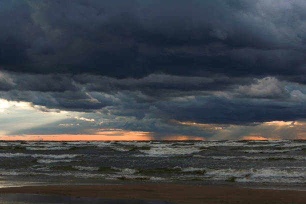 istock Stormy sunset on the sea 1452539326