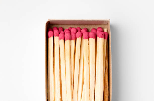 Matches macro. Open matchbox close-up on a white background. stock photo