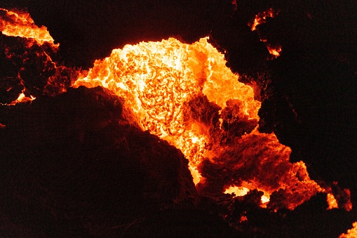 An aerial view of the volcano eruption at night