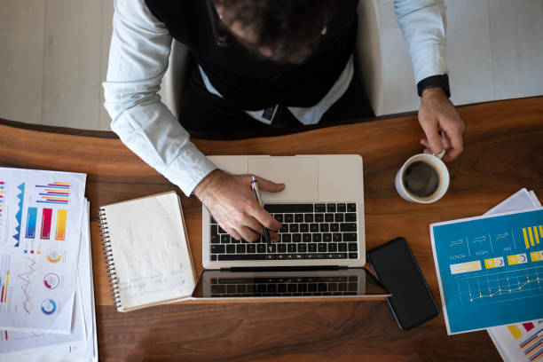 istock Businessman working from home office 1452545644