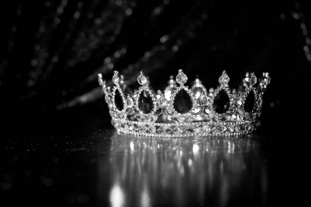istock Luxury sparkle crown on rich sparkle background. Black and white. 1452548224