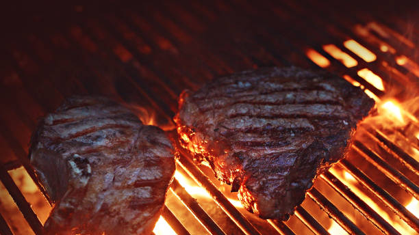 istock Rib-eye Steak on Grillover flames 1452549536