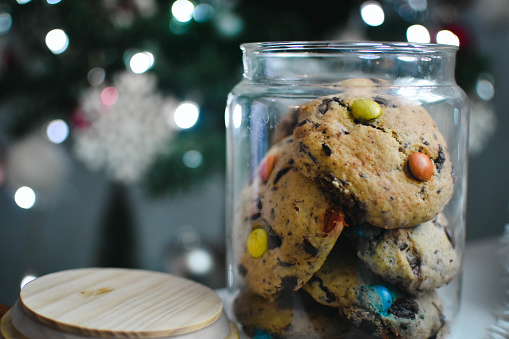 Some chocolate chips cookies in a glass.
